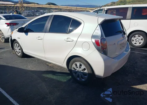 2014 Toyota Prius C Two z USA, uszkodzony, nr VIN JTDKDTB39E1085136